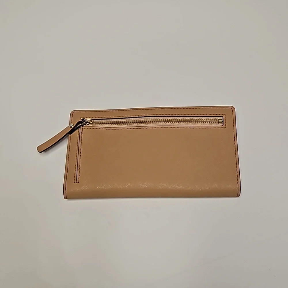 Kate Spade beige medium tote with adjustable crossbody. Includes matching wallet